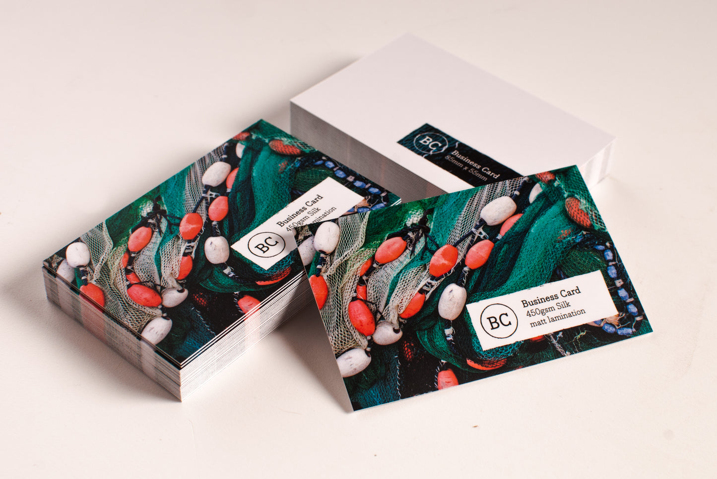 Single sided business cards 450gsm silk and matt laminated.